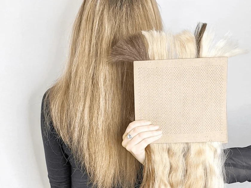 Colour matching blond hair extension to real hair