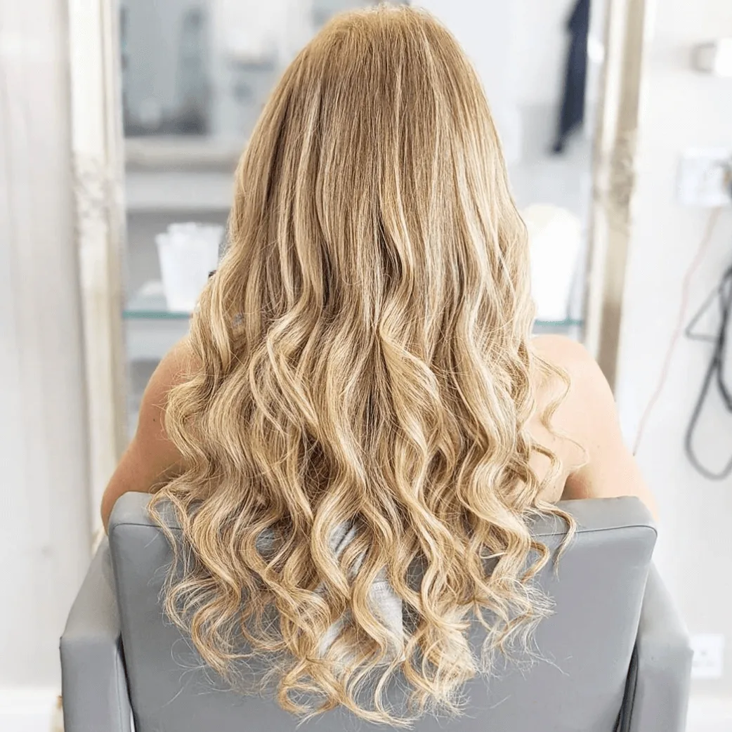 Long blond curly hair extensions